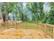 Inviting wooden deck with natural surroundings, creating a peaceful outdoor retreat at 942 Lawton Sw St, Atlanta, GA 30310