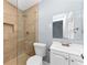 This bathroom has tile shower and modern vanity, providing a fresh and updated look at 942 Lawton Sw St, Atlanta, GA 30310