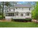 Spacious backyard with a deck, screen porch, and ample green space at 1275 Mayfield Rd, Milton, GA 30009