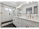 Modern bathroom with dual vanities, quartz countertops, and a glass-enclosed shower at 1275 Mayfield Rd, Milton, GA 30009