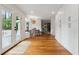 Inviting dining area with natural light, built in nook, hardwood flooring, and convenient access to the deck at 1275 Mayfield Rd, Milton, GA 30009