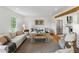 Cozy living room connected to the kitchen with stainless steel appliances and comfortable seating at 1275 Mayfield Rd, Milton, GA 30009