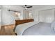 Relaxing main bedroom features a sliding barn door to the bathroom, and a closet at 1275 Mayfield Rd, Milton, GA 30009