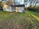 Lawn surrounds home with patchy grass and fallen leaves at 274 Fairburn Nw Rd, Atlanta, GA 30331