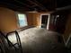 Living room with bare walls, carpet, and natural light from a window at 274 Fairburn Nw Rd, Atlanta, GA 30331