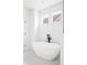 Bright bathroom featuring a standalone modern bathtub with black matte hardware at 2761 Mathews St, Smyrna, GA 30080