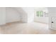 Large bonus room featuring two storage closets and a large window at 2761 Mathews St, Smyrna, GA 30080