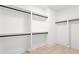 Spacious closet featuring open shelving and matte black rods at 2761 Mathews St, Smyrna, GA 30080