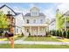 Attractive two-story home with a well-manicured lawn and inviting front porch at 2761 Mathews St, Smyrna, GA 30080