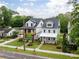 Charming new construction homes with manicured lawns, landscaping, and sidewalks at 2761 Mathews St, Smyrna, GA 30080