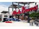 Stadium entrance with signage, plaza, seating, and dining options for fans at 2761 Mathews St, Smyrna, GA 30080