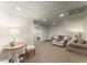 Cozy basement area features neutral walls, carpeted floors, and comfortable seating at 725 Danbridge Way, Roswell, GA 30076
