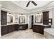Bright bathroom with and vanities, soaking tub, and a walk-in closet at 725 Danbridge Way, Roswell, GA 30076