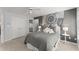 Light and airy bedroom showcasing neutral walls, ceiling fan and an eye-catching wall tapestry at 725 Danbridge Way, Roswell, GA 30076