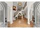 Grand foyer with high ceilings and hardwood floors at 725 Danbridge Way, Roswell, GA 30076