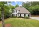 Elegant home with lush landscaping and a well-maintained lawn at 725 Danbridge Way, Roswell, GA 30076