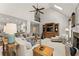 Spacious living room features a fireplace, comfortable seating, and open floor plan at 725 Danbridge Way, Roswell, GA 30076
