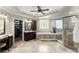 Luxurious main bathroom with soaking tub, glass-enclosed shower, and dual vanity at 725 Danbridge Way, Roswell, GA 30076