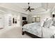 Bright main bedroom with trey ceiling, plush carpet, and ample space for relaxation and rest at 725 Danbridge Way, Roswell, GA 30076