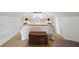Attic bedroom with sloped ceilings features a comfortable bed and stylish bedside lamps at 820 Wilson Nw Rd, Atlanta, GA 30318