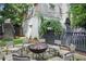 Inviting backyard patio with a fire pit and comfortable seating, perfect for outdoor entertaining at 820 Wilson Nw Rd, Atlanta, GA 30318