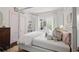 Charming bedroom featuring a four-poster bed and beautiful natural light at 820 Wilson Nw Rd, Atlanta, GA 30318