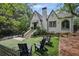 Stunning exterior view of a well maintained home with manicured lawn and garden at 820 Wilson Nw Rd, Atlanta, GA 30318