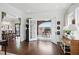 Open-concept living area with hardwood floors and an open view to the dining room at 820 Wilson Nw Rd, Atlanta, GA 30318
