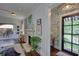 Bright and airy living room with fireplace, hardwood floors, and view of the dining room at 820 Wilson Nw Rd, Atlanta, GA 30318