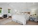 Bright main bedroom with a brick fireplace and plenty of natural light at 820 Wilson Nw Rd, Atlanta, GA 30318