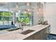A stylish kitchenette features sleek countertops, modern fixtures, and upscale finishes for convenience and entertaining at 950 W Peachtree Nw St # 904, Atlanta, GA 30309