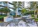 An outdoor kitchen with a built-in grill and dining space, perfect for al fresco dining and entertaining guests at 950 W Peachtree Nw St # 904, Atlanta, GA 30309