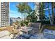 A stylish outdoor lounge features comfortable seating and city views, ideal for relaxing and socializing at 950 W Peachtree Nw St # 904, Atlanta, GA 30309
