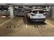 Parking garage with a white SUV parked in spot 184 at 950 W Peachtree Nw St # 904, Atlanta, GA 30309