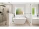 This bathroom features a soaking tub and walk-in shower at 121 Brendylynn Trce, Woodstock, GA 30188
