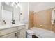 This bathroom features a tub and shower combination with vanity at 121 Brendylynn Trce, Woodstock, GA 30188