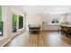 Open dining area featuring a view of the outdoor scenery and stylish contemporary furnishings at 121 Brendylynn Trce, Woodstock, GA 30188