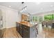 Beautiful kitchen with a functional island, and a view of the living room at 121 Brendylynn Trce, Woodstock, GA 30188