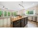 Bright kitchen with a beautiful island that offers easy access to the dining room at 121 Brendylynn Trce, Woodstock, GA 30188