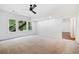 Spacious living room with natural light and an exit to the back yard at 121 Brendylynn Trce, Woodstock, GA 30188