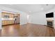 Open floor plan with fireplace and view into kitchen at 121 Brendylynn Trce, Woodstock, GA 30188
