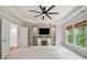 Spacious main bedroom featuring a fireplace, media center and large windows at 121 Brendylynn Trce, Woodstock, GA 30188