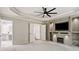 Spacious main bedroom featuring a fireplace, media center and large windows at 121 Brendylynn Trce, Woodstock, GA 30188