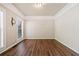 Neutral room with hardwood floors, bright trim and windows at 121 Brendylynn Trce, Woodstock, GA 30188