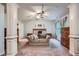 Large bedroom featuring a projector screen, ceiling fan, home office, and sitting area at 2212 Knoxhill Se Vw, Smyrna, GA 30082