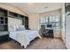 Cozy bedroom featuring a built-in bed, desk, and a bright window view at 2212 Knoxhill Se Vw, Smyrna, GA 30082