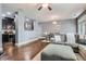 Comfortable living area seamlessly flowing into dining space, highlighted by hardwood floors and modern design elements at 2212 Knoxhill Se Vw, Smyrna, GA 30082