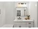 Bathroom with modern fixtures, a large mirror, and a sleek vanity at 2438 2Nd Nw St, Atlanta, GA 30318