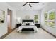 Bedroom featuring hardwood floors, recessed lights, a ceiling fan, and lots of natural light at 2438 2Nd Nw St, Atlanta, GA 30318