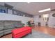 Spacious basement featuring a comfortable sitting area and a desk area, with gray walls at 324 Madeline Way, Temple, GA 30179